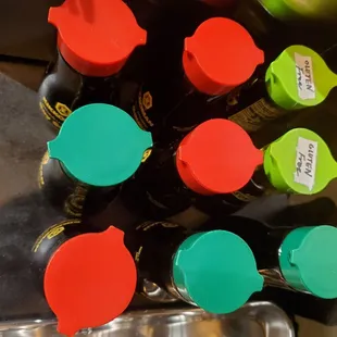 a close up of a variety of bottles
