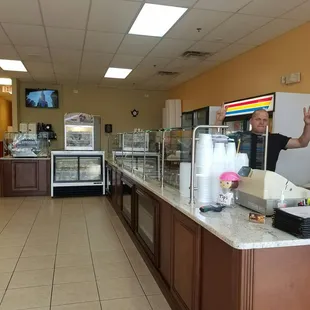 a man behind a counter