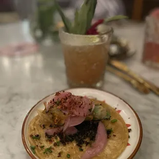 Squash blossoms taco is delicious first time trying one the tortillas are fresh.