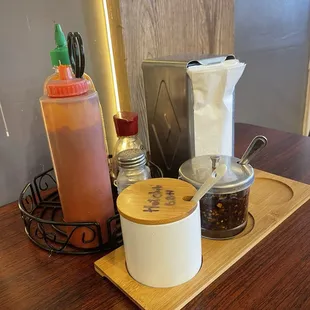 Condiment area, the ceramic container has extra sate for your BBH and is labeled