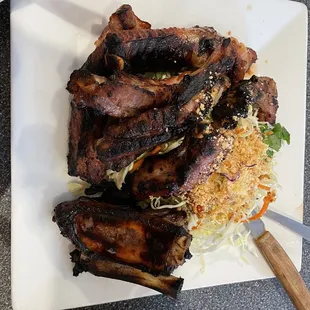 Grilled pork ribs with shredded cabbage, also excellent with rice. Ribs were perfectly marinated and grilled.