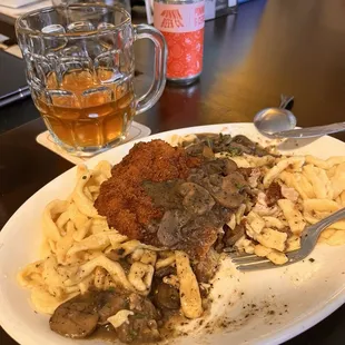 Jägerspaetzle with a tasty chicken schnitzel.