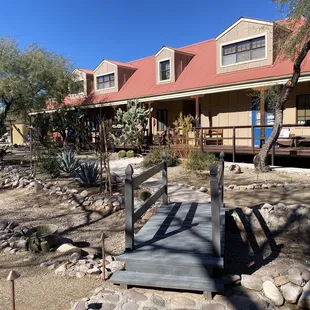 Photo taken from very nice courtyard area where there are a couple different sitting areas and a gas fire pit