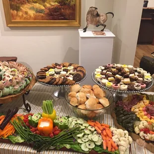 a variety of food displayed on a table