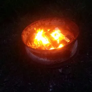 Fire pit burning wood they provided