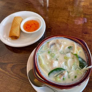 Complimentary spring roll with lunch entree (not yet out)  and small Tom yum chicken soup
