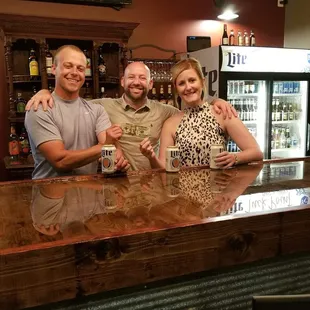 three men and a woman