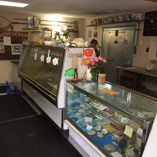 a woman behind the counter