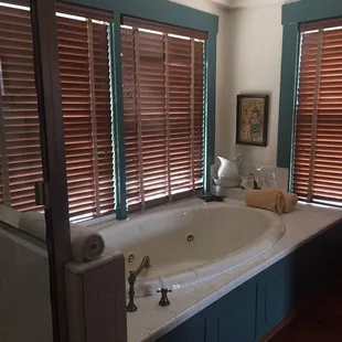 Bathroom with 2 person jetted tub and shower stall