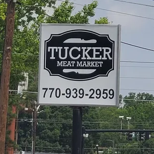 a sign for tucker meat market