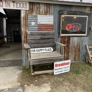 a bench in front of a building