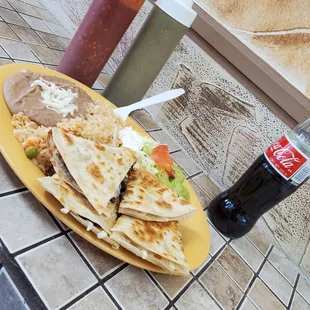 Beef quesadilla with a drink