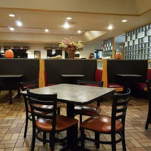 a table and chairs in a restaurant