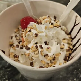 Fudgeanna - two scoops of ice cream, hot fudge, banana slices, whipped cream, nuts, and a cherry.