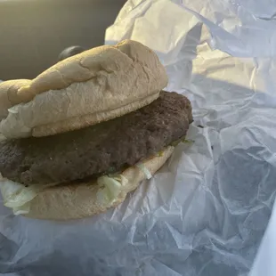 A impossible burger  from Nw 23rd Tucker&apos;s impossible meat is thick and not flat