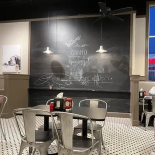 Inside - they have a chalkboard that you can write on.  There were kids playing with it while they waited for their food