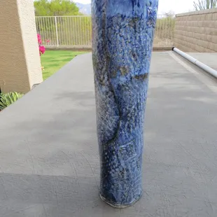 Student - tall blue vase made with slab work and impression designs by Doug Stevenson
