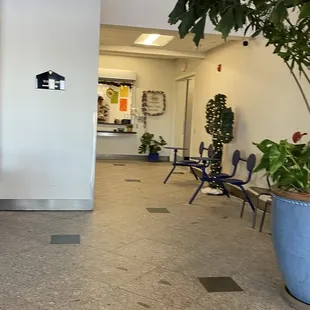 Located to the right back of the entrance way.
