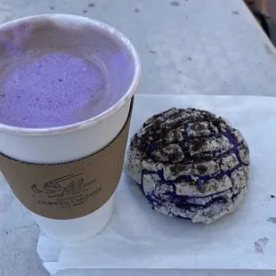 Both the delicious ube latte and the soft flavorful ube concha filled with rich ube cream and sprinkled with Oreo dust.