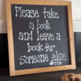 Sign on the book shelf