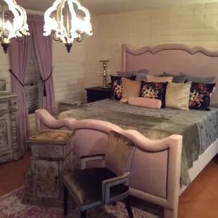 Velvet headboards and pillows with coverlet and everything is custom made