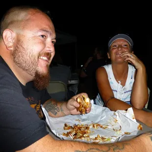 a man and a woman eating