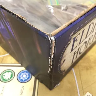 Ripped box and our attempt to sturdy it