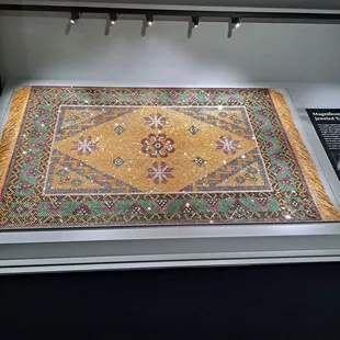 This is entirely made of jewels....diamonds, rubies, sapphires and something else I can't remember.