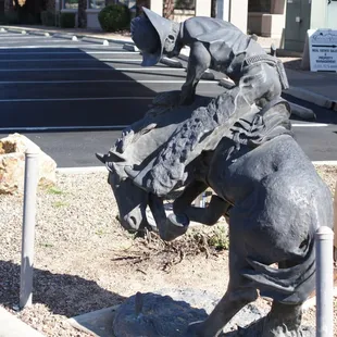 Art sculpture in front of business