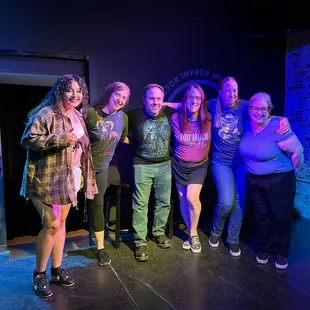 a group of people posing for a picture