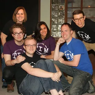 a group of people posing for a picture