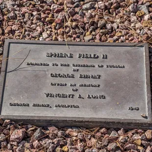 a plaque on the ground