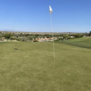 15th green with the extended flag.