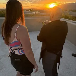 Doug giving Erin a champagne opening lesson