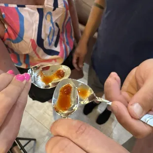 Sampling hot sauce from South Africa