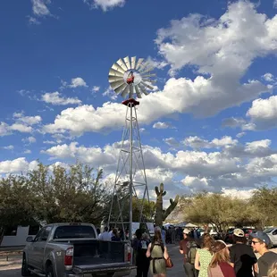 a windmill and a crowd of people