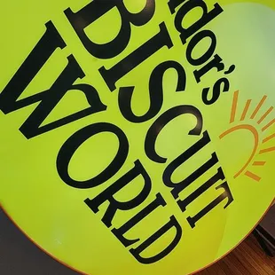 a yellow balloon with the words