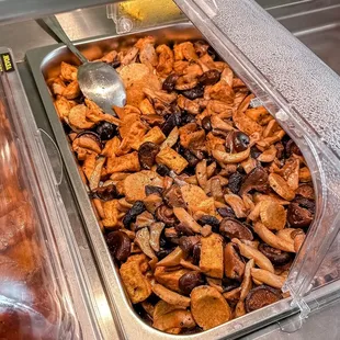 a variety of food items in a buffet