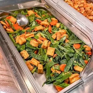 tofu and vegetables in a buffet