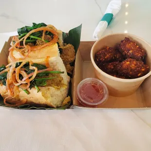 a sandwich and dipping sauce