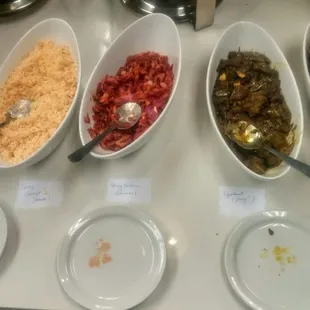 Limes and Sambals, L-R, Spicy Coconut, Spicy Onion, Spicy Eggplant, Sweet Tamarind and Onion