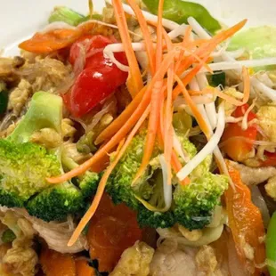 Pad woonsen. Bean thread noodles stir fried with chicken and mixed vegetables.  We can make this vegetarian and gluten free.