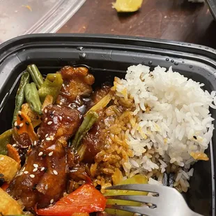  a close up of a meal in a plastic container