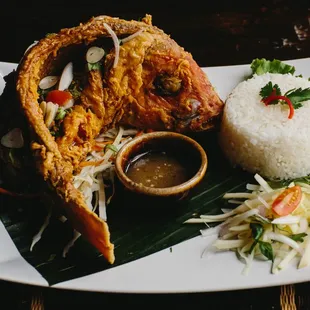 Whole fried red snapper with chili lime sauce and green mango salad