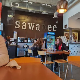 a woman sitting at a table