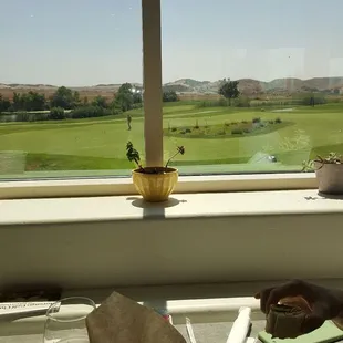 View from inside restaurant overlooking the golf course