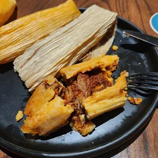 a plate of mexican food on a table