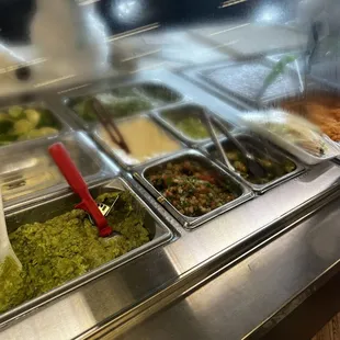 Guacamole, pico de gallon, red/green salsas, refried beans, Mexican rice.... great for grab n go as complements to your next taco feast