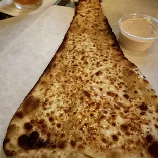 Cheese pizza with jalapeño sauce