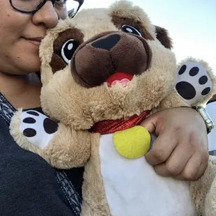 Help me name the puppy Ronnie won me. (P.S. he broke the high striker game doing it)